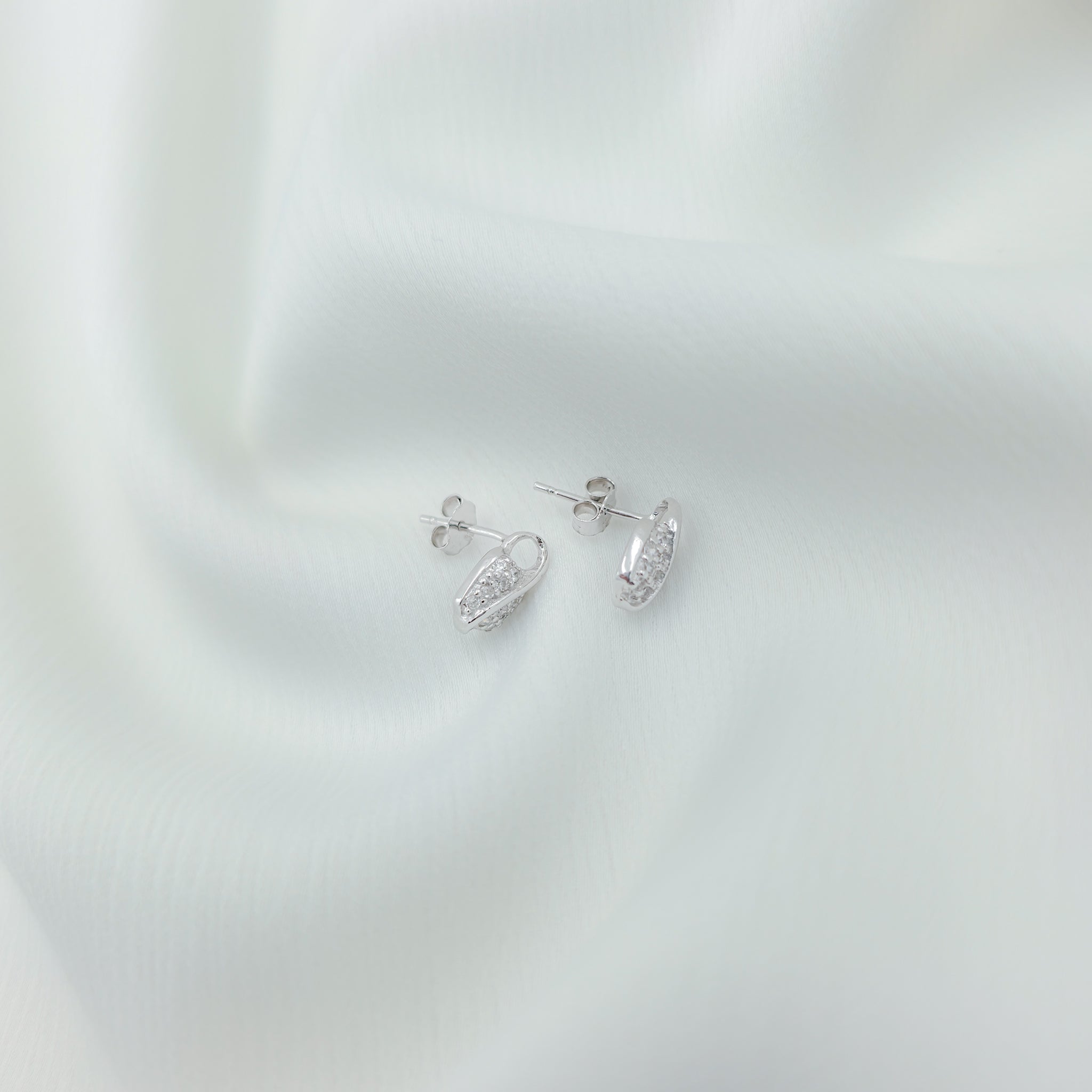 Elegant Pavé Cubic Zirconia Wave Stud Earrings in 925 Sterling Silver