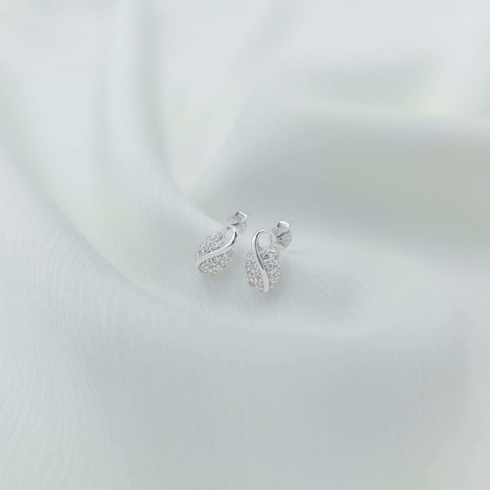 Elegant Pavé Cubic Zirconia Wave Stud Earrings in 925 Sterling Silver